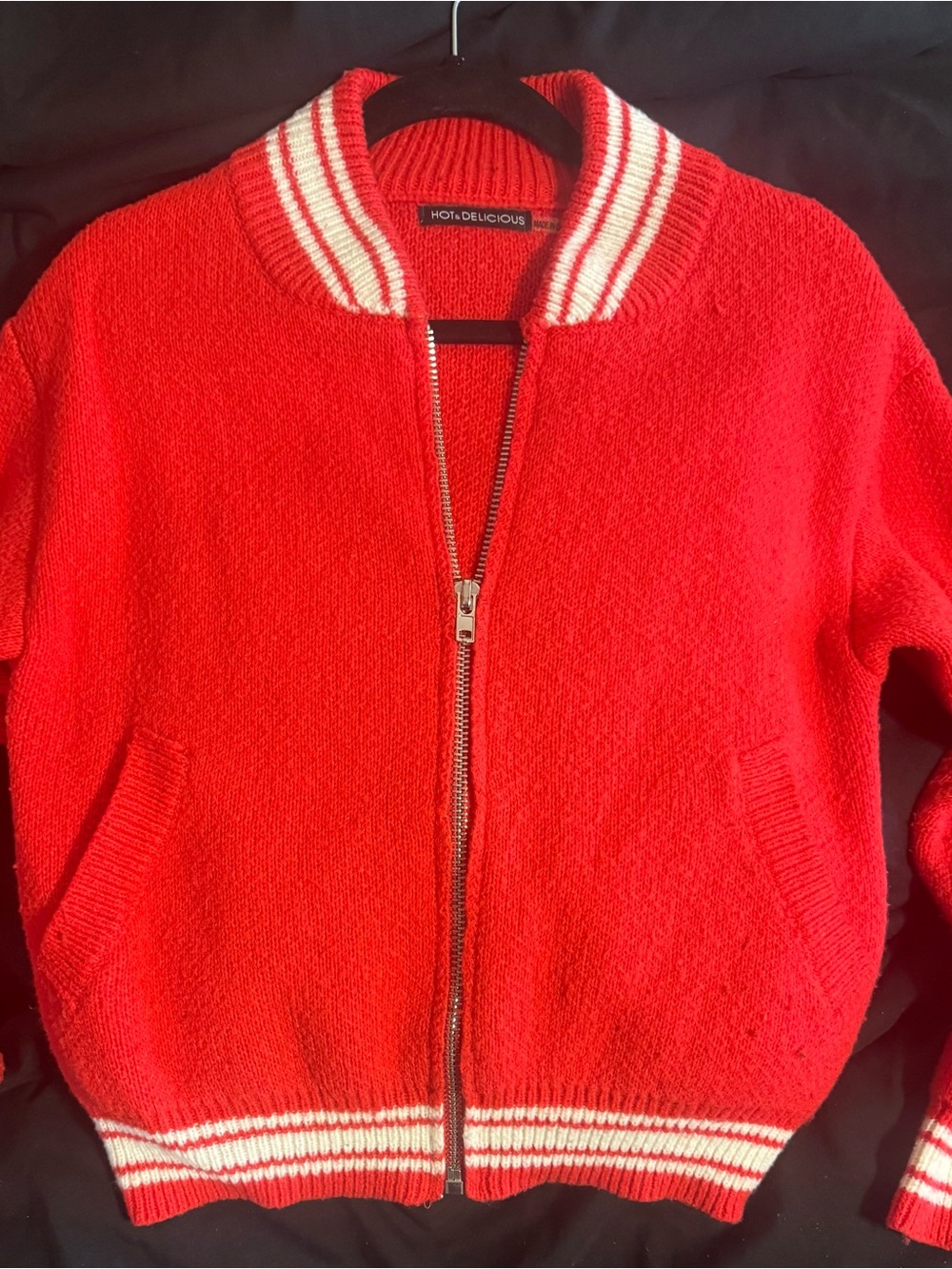 Red zip-up sweater